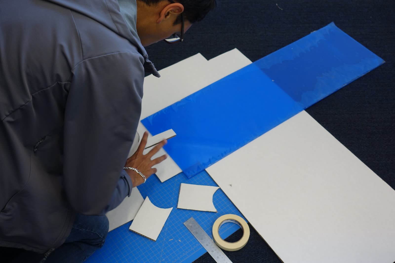 Jugraj cutting materials to build a physical park model
