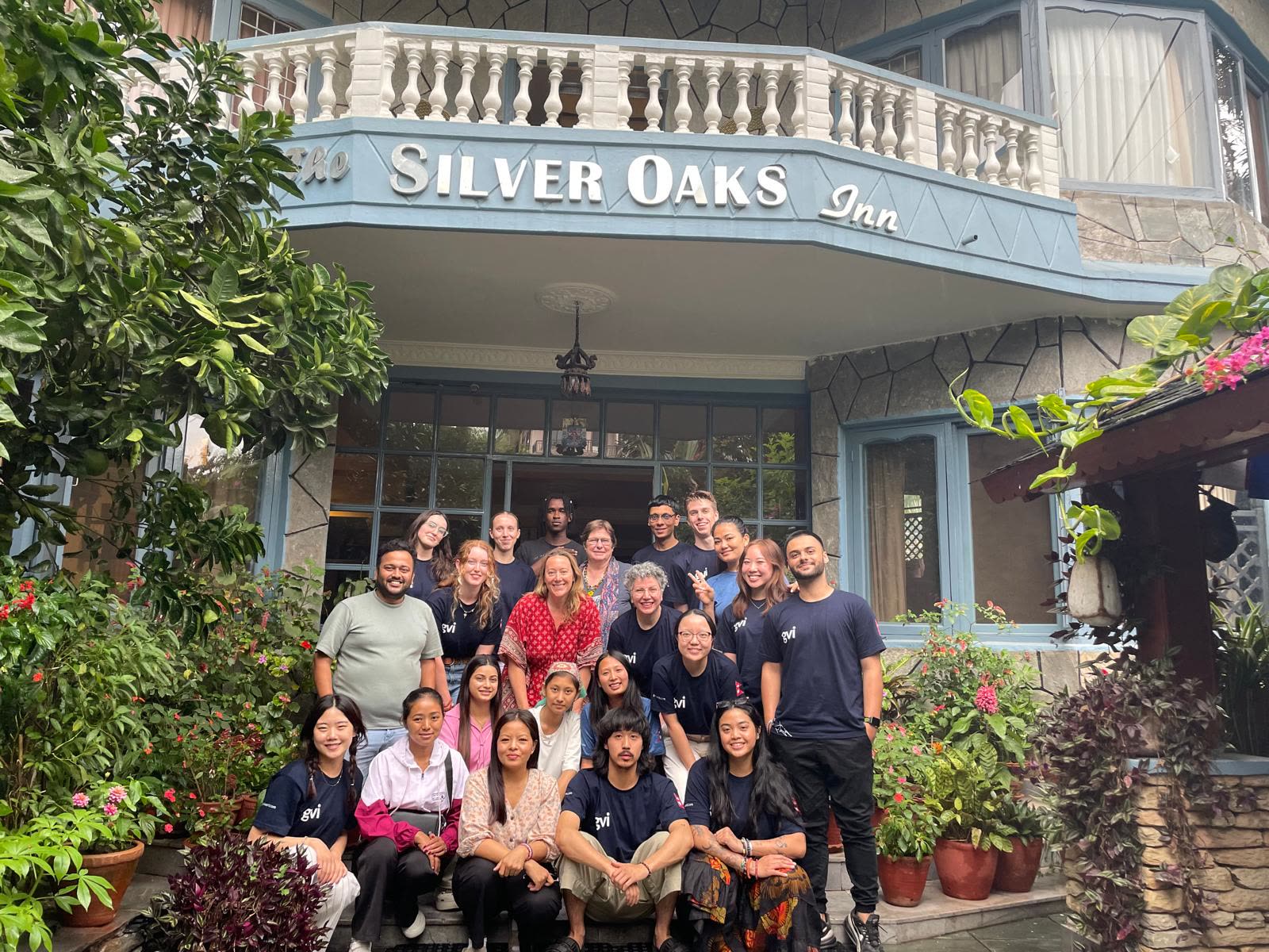 The full group outside Silver Oaks Inn in Pokhara